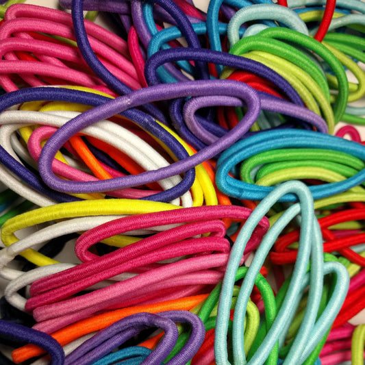 wholesale bulk packed hair accessories, specifically hair ties