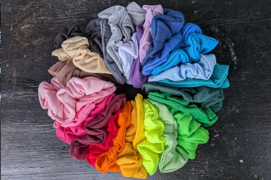 threddies stock scrunchies in so many colors, this is a circle of scrunchies in a rainbow of colors